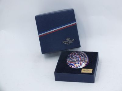 a close up of a box with a glass object inside of it