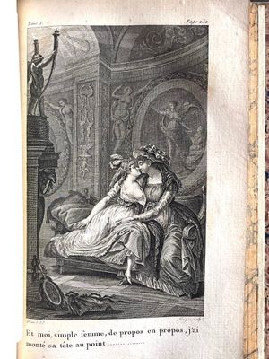 an old book with a picture of a woman sitting on a bed