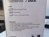 a box of thunderbolt dock on the table