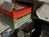 a kitchen with a stove and a dishwasher in it