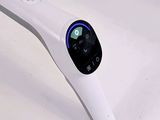 a white device sitting on top of a white table