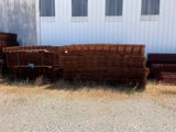 a lot of wickers sitting outside of a building