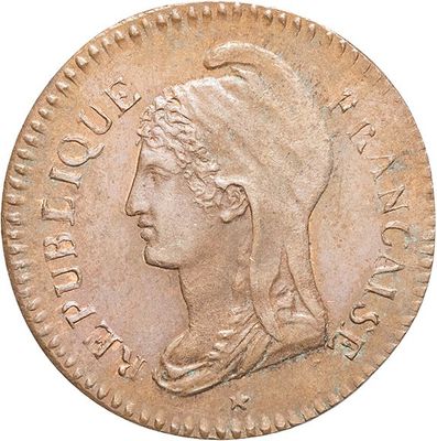 a close up of a coin with a woman ' s head on it