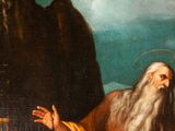an image of a painting of a man with a long beard sitting on a rock