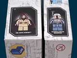 two boxes of lego star wars action figures on display