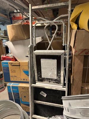 a lot of boxes and a television in a room