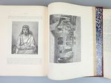 an open book with a picture of jesus on it