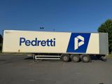 a semi truck that is parked in a parking lot