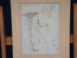 a picture of a picture of a map hanging on a wall