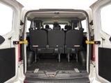 four seats in the back of a van with the doors open