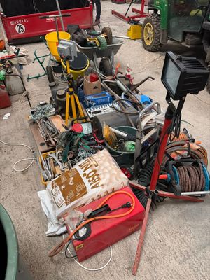 a lot of tools that are sitting on the ground