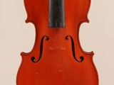 an old violin with a black bow on a white background