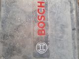 an image of a close up of a piece of metal with the word bosch on it