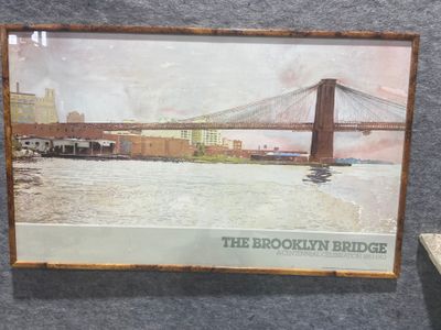 a picture of a picture of the brooklyn bridge on display