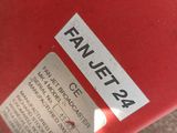 a red fire hydrant that has a sticker on it