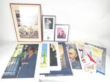 a lot of books and pictures on the table