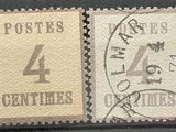 deux timbres portant les chiffres quatre et quatre