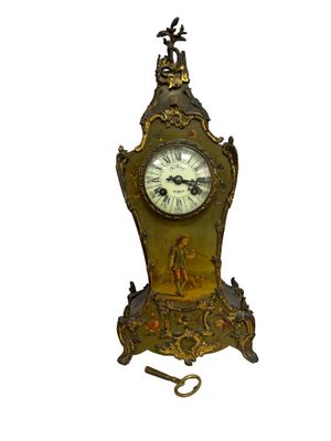 a clock that is sitting on a stand on a white background