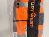 a bag of orange vests sitting on a table