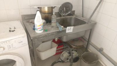 an image of a kitchen with a washer and dryer in it