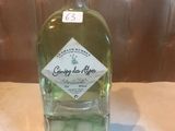 a bottle of liquor that is sitting on a table