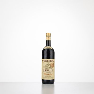 a bottle of red wine sitting on top of a table