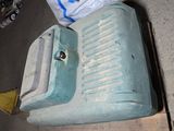 a blue water tank sitting on top of a pallet