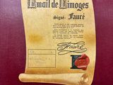 a paper scroll with a wax seal attached to it