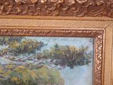 a picture of a painting hanging on a wall