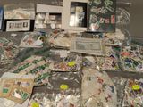 a lot of stamps and postcards on a table