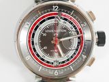 a close up of a wrist watch with a black and red face