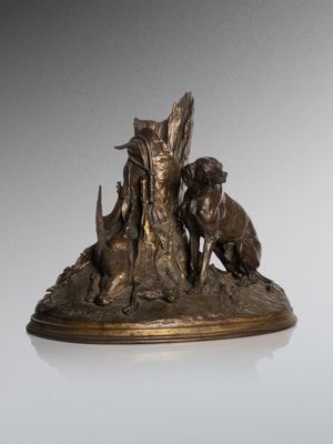 an image of a bronze statue of a woman and two dogs