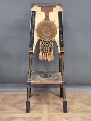a wooden chair with a basketball net on it