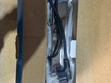 a box that has a charger and a cord in it