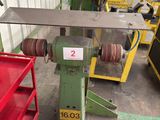 a machine that is sitting in a factory with a lot of tools