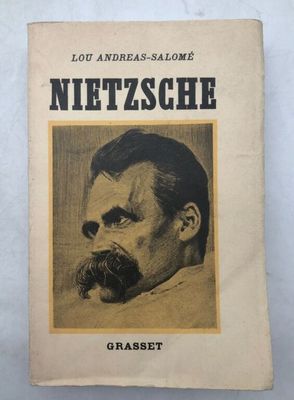 an old book with a picture of a man with a mustache