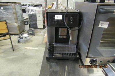 an image of a coffee machine on a counter in a store