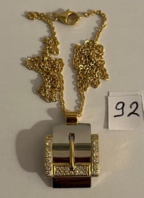 Chaîne en or jaune, soutenant un pendentif Boucle de Ceintur…