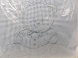 a picture of a picture of a teddy bear in a bag