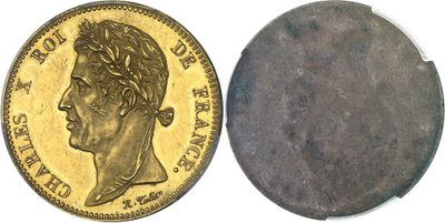a close up of a coin on a white surface