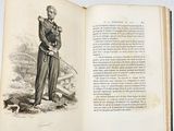 an open book with a drawing of a man in uniform