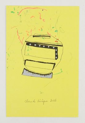 yellow piece of paper with a drawing of a toaster on top of it