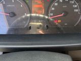 a close up of a car dashboard with a speedometer