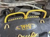 a pair of shoes and a bag on the ground