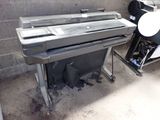 a piano sitting next to a printer in a room