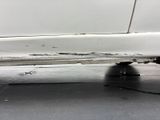 a close up of a car ' s rear end with a tire