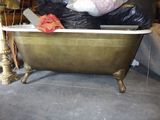 a bathtub that is sitting in the middle of a room