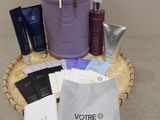 a basket with a lot of cosmetic items on it