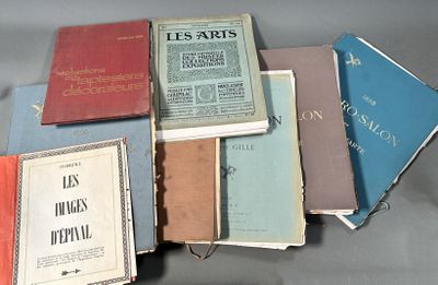 a lot of books that are sitting on a table