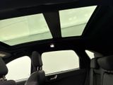 a view of the sunroof of the inside of a car